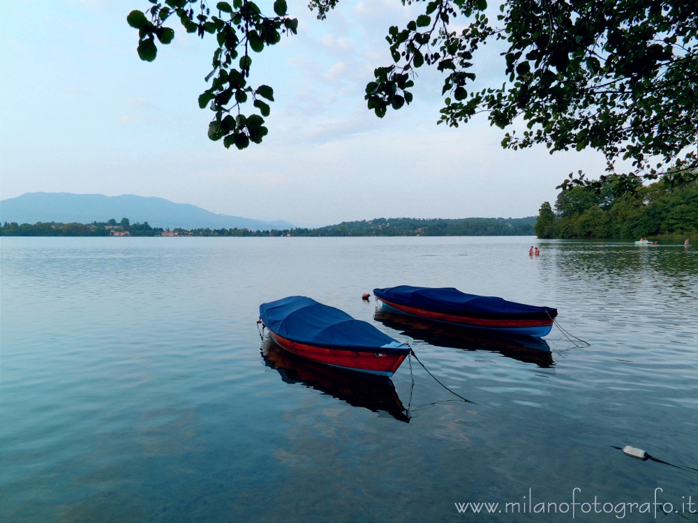 Cadrezzate (Varese, Italy) - Two boats in Lake Monate at darkening